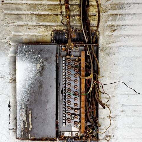 old fuse board open, loose conductors
