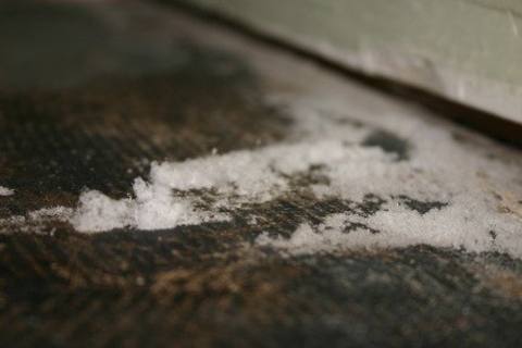 white crust on a floor, dry
