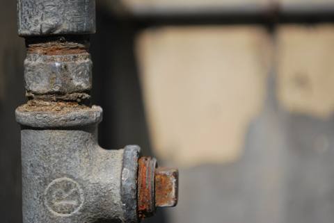 rust on a steel pipe tee, dry