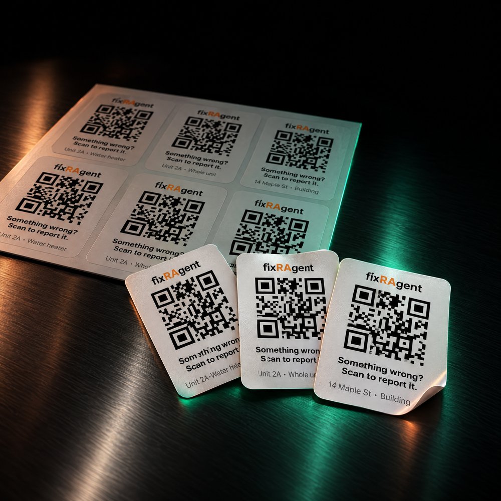 A printed sheet of fixRAgent QR stickers: one for a water heater, one for a whole unit, one for a building