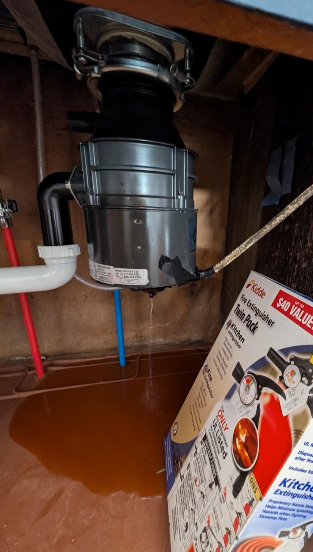 The garbage disposal from the card above, photographed in a building we own