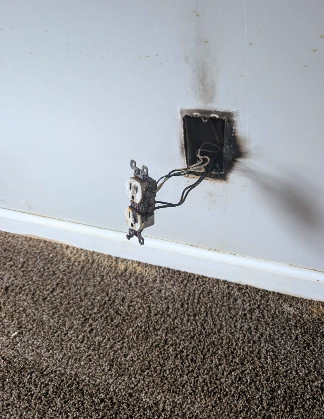 A resident's photo of a burnt outlet