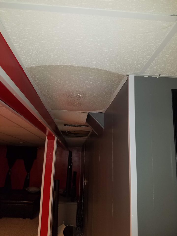 Tenant photo: a water stain on a basement ceiling